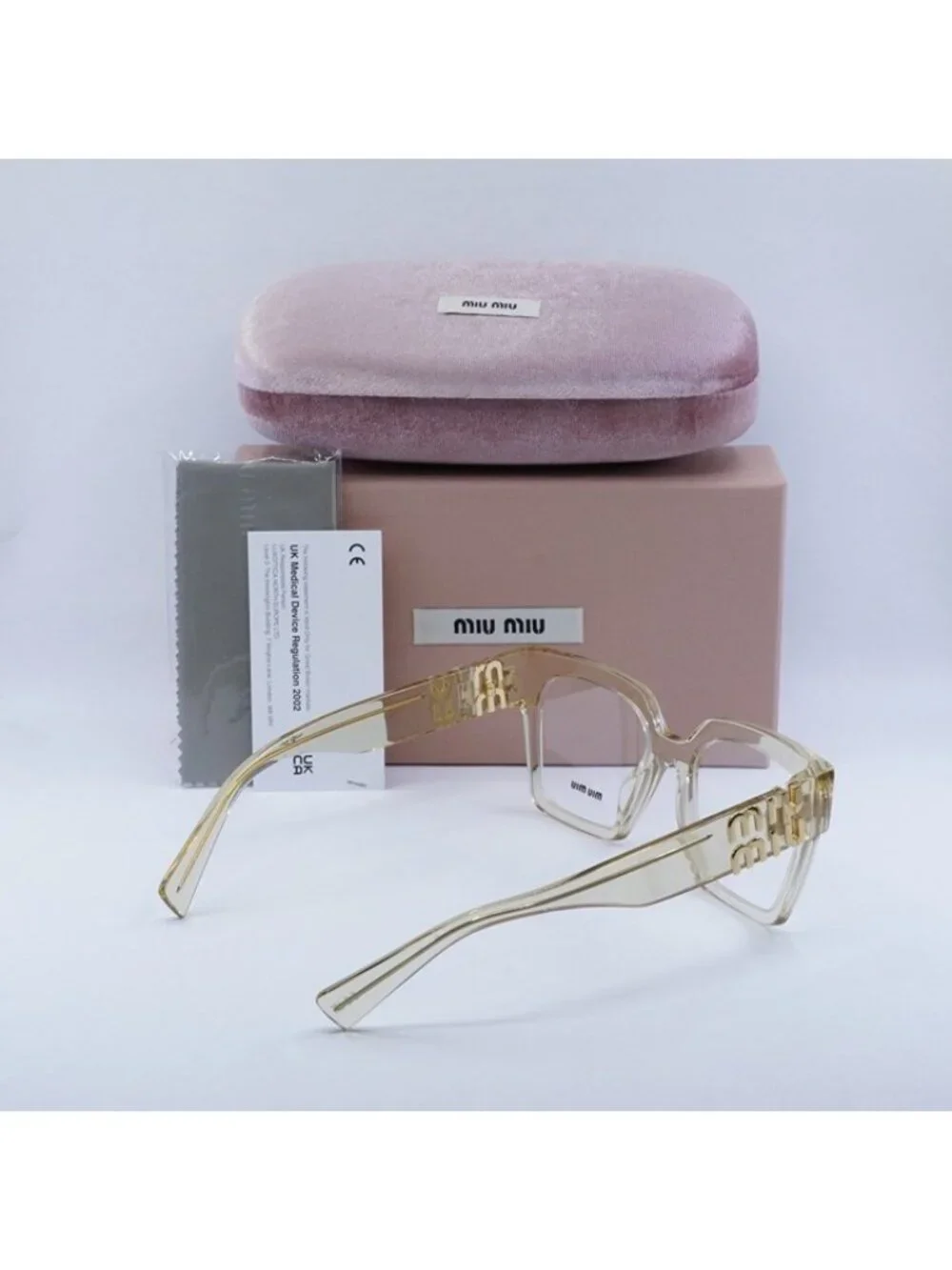 Miu Miu MU04UV 11T1O1 Eyeglasses Transparent Sand 52mm Square Frame